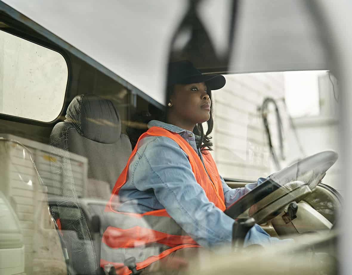 woman driving truck