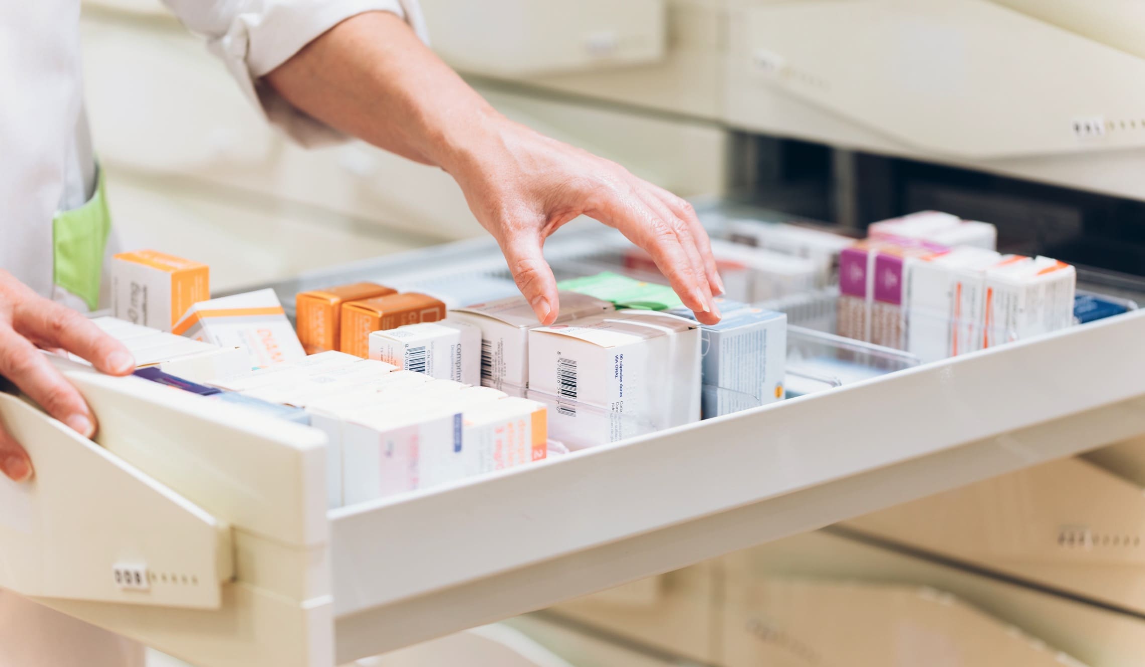 pharmacist looking at medicine